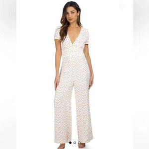 Free People Mia Jumpsuit size 0 peach print jumpsuit cream color